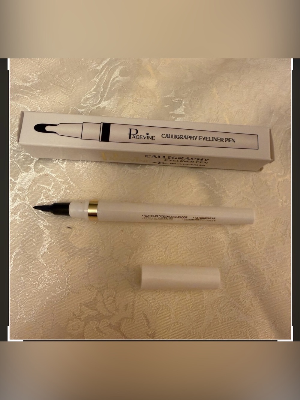 Pagevine Calligraphy Eyeliner Pen in White with 
JET BLACK